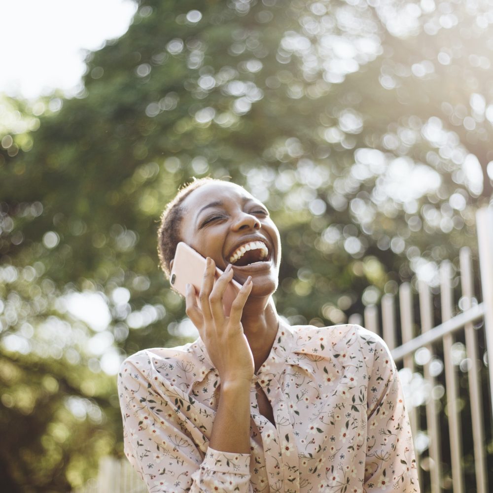 Happy woman on the phone